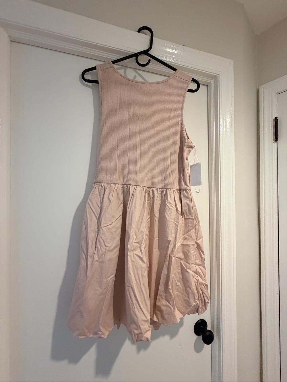 Ribbed knit bubble hem mini dress.